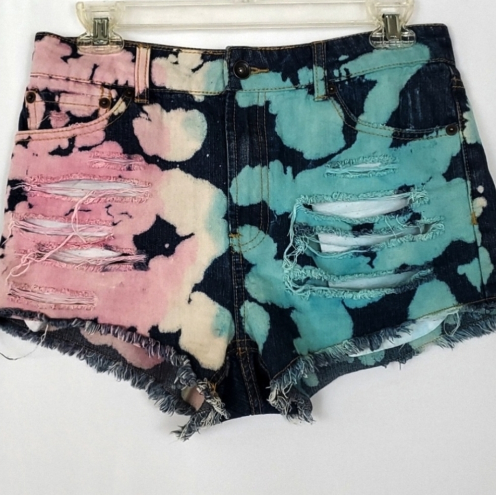 Uniq distressed tie dye jean cut-off shorts